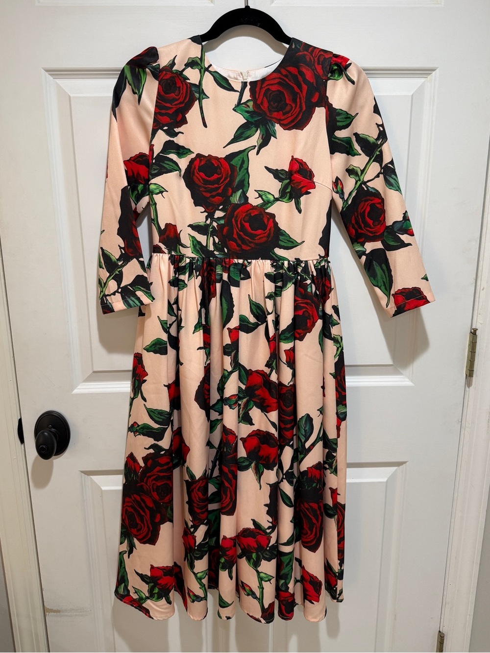 Flattering Pink Long-Sleeve Midi Dress with Red Rose Print